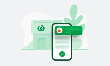 Simple illustration of a mobile with the app overlaps silhouettes of a Woolworths store and a potted plant.